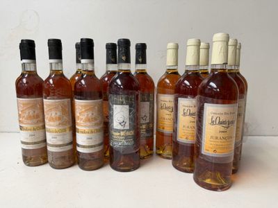 several bottles of wine are lined up on a table