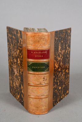 an old book that is open to show the pages