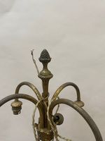 Candélabre en métal doré et patiné à quatre bras de lumière. (photo 4)