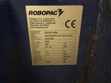 an image of a close up of a blue machine with a label on it