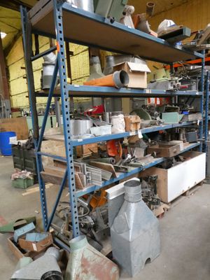 a lot of items on the shelves in the garage