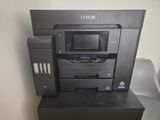 a printer that is sitting on top of a desk