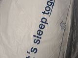 a pillow that is sitting on top of a plastic bag