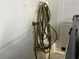 a hose that is attached to a wall in a room