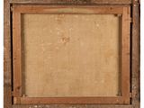 an old wooden frame with a piece of fabric hanging on it
