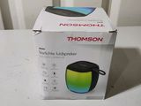 a box that has a bluetooth speaker inside of it
