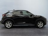 a picture of a black car parked in a garage