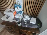 a small table with a lot of electronics on it
