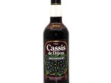 bottle of cassois de bjoon liqueur on a white background