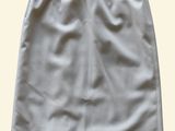 a white skirt is shown on a white background