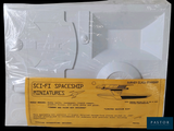 a picture of a box with a picture of a space ship in it