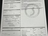 a paper with a picture of a security identification sheet