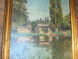 une image d'un tableau accroché au mur