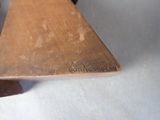a piece of metal that is sitting on a table