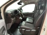the interior of a truck with the driver ' s seat folded down