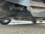 a close up view of a car ' s exhaust pipe and exhaust pipe