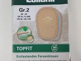 the packaging of a pair of foot pads is shown on a white surface