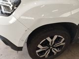 a close up of the front of a white car