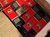 a box full of cigarettes sitting on the floor