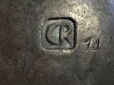 a metal ball that has a small logo on it