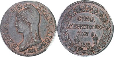 a close up of a coin with a woman ' s head on it