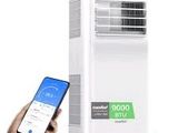 une image représentant une personne tenant un smartphone à côté d'un climatiseur