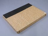 a brown box with a black strip on it