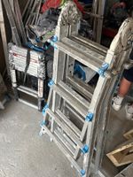 Un ensemble de cinq échelles dont 4 coulissantes et une éche… (photo 4)