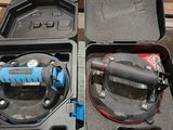 two tools in a case that are sitting on a table