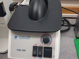 a computer mouse sitting on top of a machine
