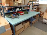 a table with a bunch of boxes on it in a room