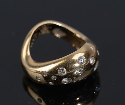 FRED, Bague "Mouvementée" en or jaune 750/1000e et diamants …