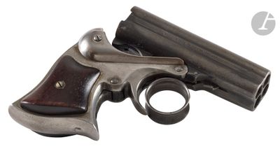 an old gun with a wooden barrel on a white background
