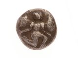 une image représentant une pièce de monnaie sur laquelle est assise une femme