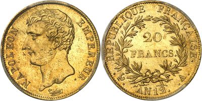 a gold coin with a woman ' s head on it