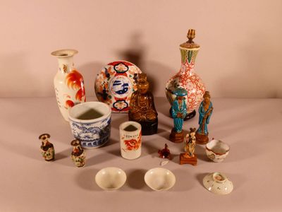 many different vases and bowls sitting on a table