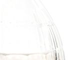 a clear glass vase with a black handle