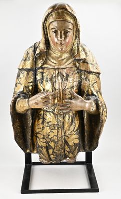 an image of a statue of a woman holding a candle