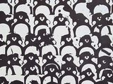 a lot of pandas that are standing together in the room