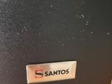 a close up of a black box with a santas logo on it