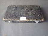 a black box with a label on it sitting on a table