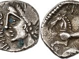 a silver coin with an image of a man on it