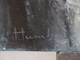 a close up of a piece of art with writing on it