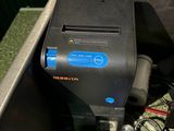 a machine that is sitting inside of a metal box