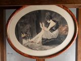 a picture of a woman sitting in a chair