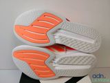 a close up of a pair of tennis shoes on a box