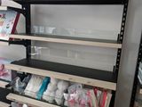 a shelf with a lot of items in it