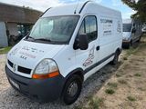 a white van that is parked on the side of the road