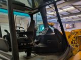 an image of a forklift inside of a building