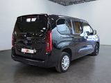 a black van that is parked in a room